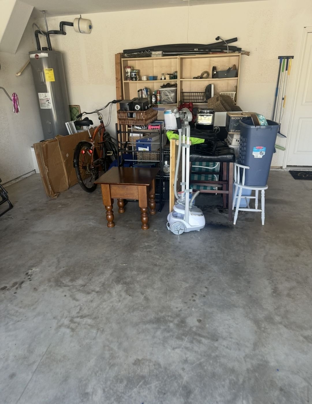 Before: Two-car garage cleanout in Cross Oak Ranch