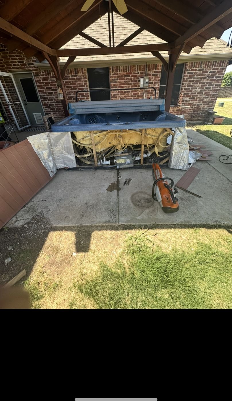 Before: Hot tub under a pergola in Corinth